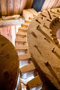 Mechanical interior of an old fashioned flour mill the netherlands Stock Photos