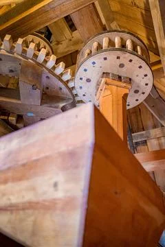 Mechanical interior of an old fashioned flour mill the netherlands Stock Photos