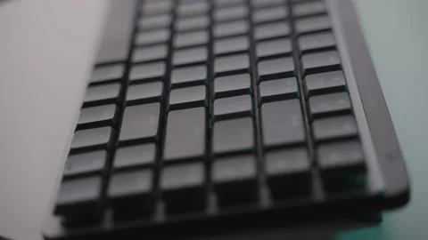 A mechanical keyboard on top of a white turn table Stock Footage 203961375