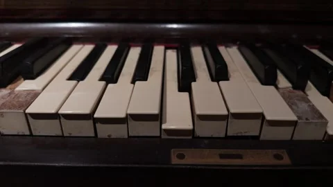 Mechanical keys move with ghostly grace, phantom echoes fill the space Stock-Footage 333798774
