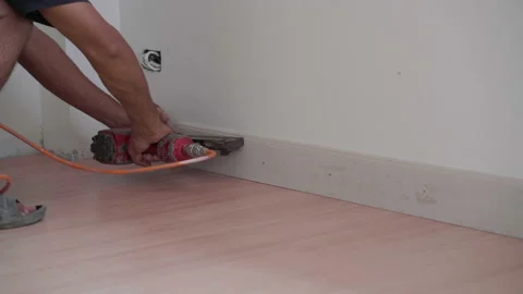 Mechanical man deocor interior of new house building Stock Footage 153339115