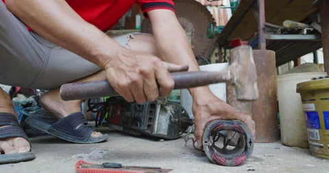 Mechanical man hand working repair electric motor low angel view Stock Footage 331688383