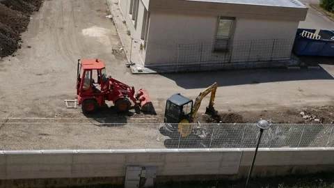 Mechanical means at work on a construction site Stock Footage 194028563