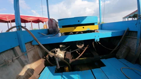 Mechanical parts and engine components inside a blue boat Stock Footage 305594342