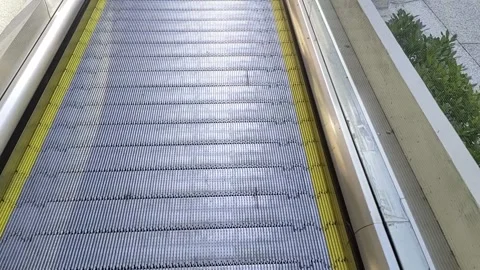 Mechanical ramp to facilitate mobility on a sloping street 스톡 동영상 251745891