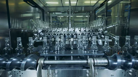 Mechanical relocation process of glass bottles Stock Footage 106862450