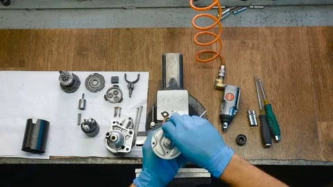 Mechanical repairs a part of the car. Time-lapse. Repair of the starter. Stock Footage 74743084