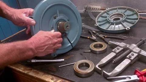 Mechanical service engineer servicing an electric motor Stock Footage 122050838
