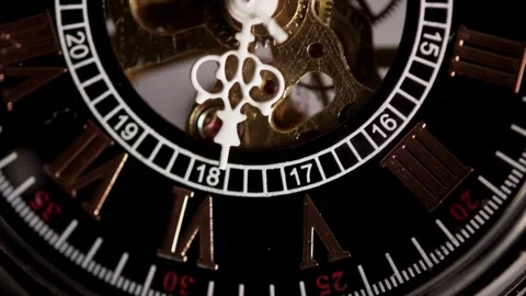 Mechanical skeleton watch dial with gears and moving hands Stock Footage 329595632