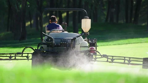 Mechanical spraying operation on the golf course Video stock 234982654