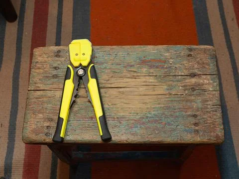 Mechanical stripper for removing electrical cable insulation, electrician too Stock Photos