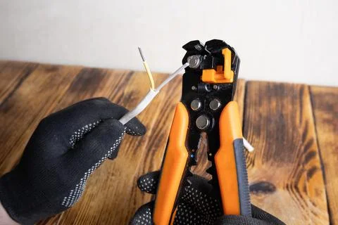 Mechanical stripper for stripping electrical cable insulation. An electrici.. Stock Photos