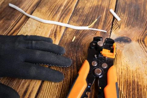 Mechanical stripper for stripping electrical cable insulation. An electrici.. Stock Photos