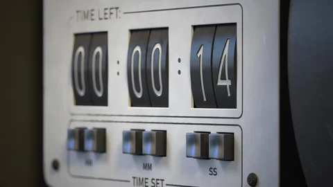 Mechanical timer close up. Countdown from 15 to 0 Stock Footage 115075432