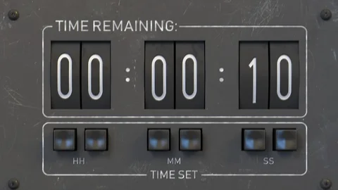Mechanical timer countdown from 15 to 0 seconds. Shot from a shaking camera Stock Footage 114325430