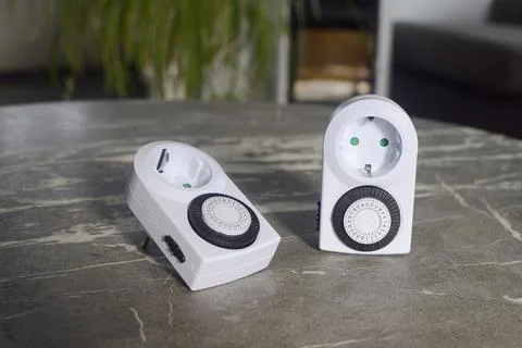 Mechanical timers for saving electricity Stock Photos