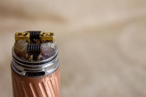 Mechanical vaper on a brown background. Mechanical vaper on a brown backgroun Stock Photos