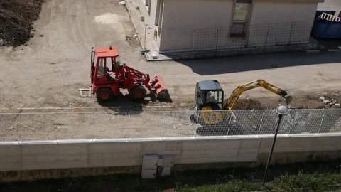 Mechanical vehicles at work on a construction site 1 Video stock 194028862