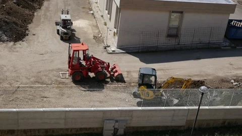Mechanical vehicles at work on a construction site 2 Video stock 194033289