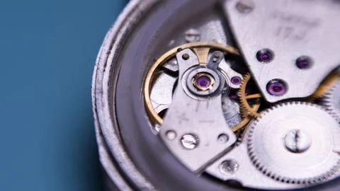 Mechanical wind watch with spinning balance wheel, closeup fast shutter speed Stock Footage 165844832