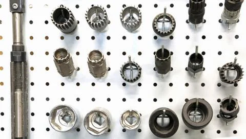 Mechanical workshop tools hanging on the fitted wall Stock-Fotos