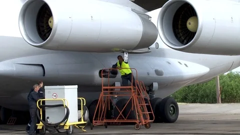 Mechanics are preparing equipment for testing of aircraft systems Il-76 aircraft Video stock 108866387