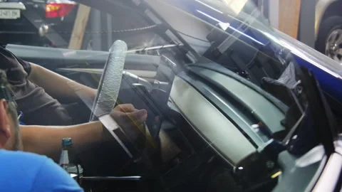 Mechanics checks operation of system pressing device screen Stock Footage 317631086