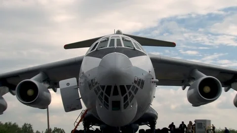 Mechanics connect equipment to systems Il-78 tanker aircraft before departure. Stock Footage 108430053