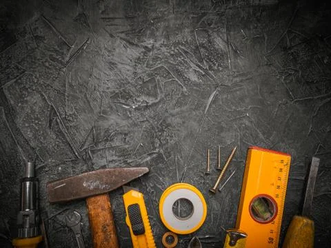 Mechanics tools on grey stone table, flat lay. Space for text. Working tools  Stock Photos