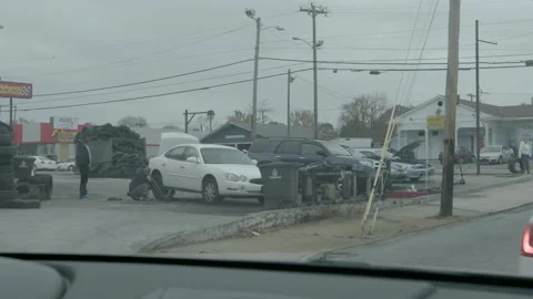 Mechanics Working on Car Outside Auto Shop Stock Footage 343937153