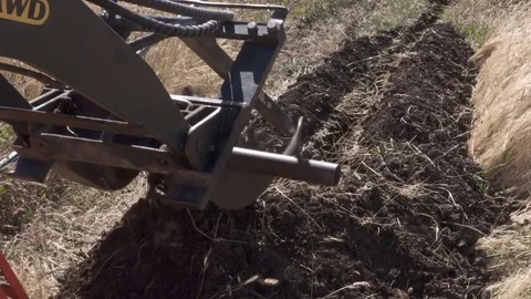Mechanised Trench Digger at work Stock Footage 71061307