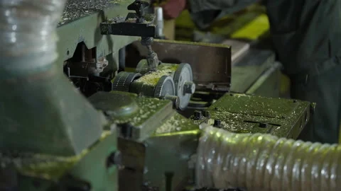 Mechanism is attached to the wood processing equipment at the production factory Stock Footage 193430282