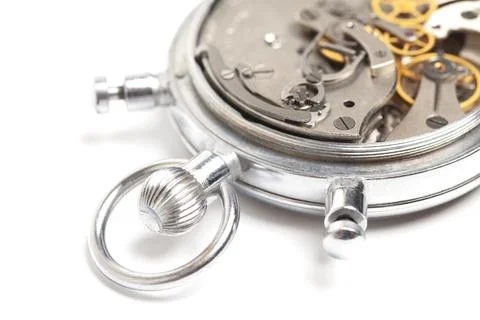 Mechanism, clockwork of a stopwatch close-up. Time, work concept Stock Photos