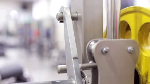 The mechanism of an exercise machine in the gym Stock Footage 83849892
