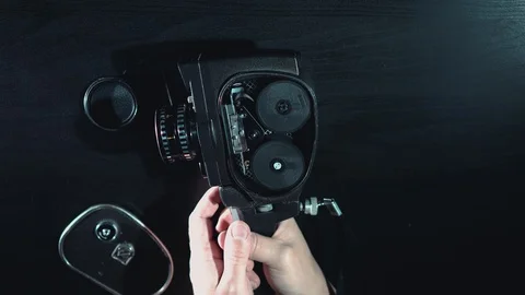 The mechanism of the film camera inside. Close-up of the camera Vidéo 128267958