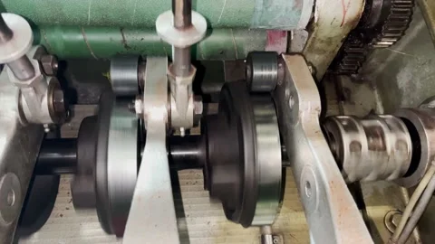 The mechanism of the knitting machine in motion Stock Footage 239659288
