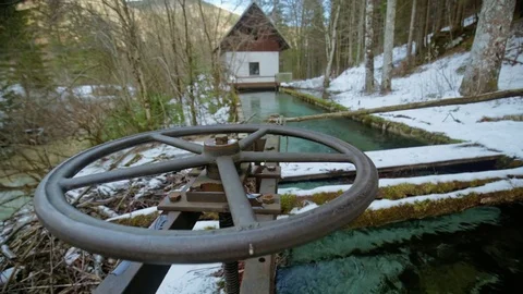 A mechanism lettig wather flow to a small hydro powerplant Stock Footage 85062829