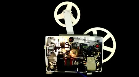 Mechanism of the old projector on black background Stock Footage 10688390