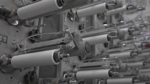 The mechanism of winding threads on bobbins Stock Footage 230982109