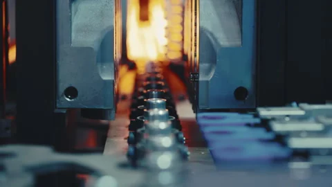 Mechanized Robot that Removes Finished Plastic Bottles from the Conveyor. Stock Footage 249418006