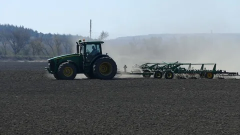Mechanized tillage by tractor. Stock Footage 127905640