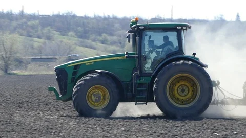 Mechanized tillage by tractor. Stock Footage 127905699