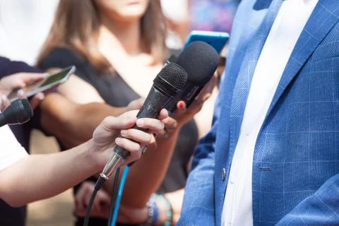 Media or press interview Stock Photos