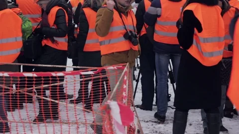 Media in work helmet and reflective vest at plant 스톡 동영상 70939996