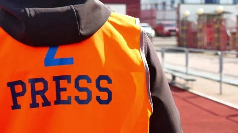 Media worker walking in uniform. Stock Footage 153392877