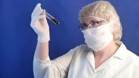 Mediacal worker with medical testing tubes Stock-Footage 84084795