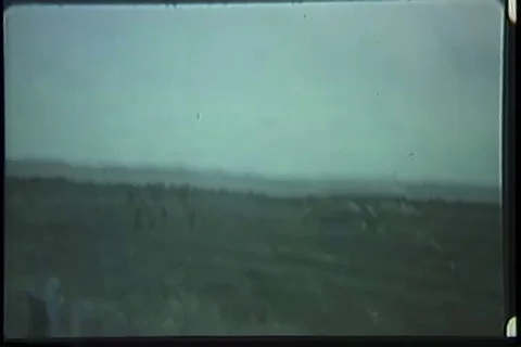 Medic load wounded Vietnamese soldier in UH-1D helicopter - 1969 Video stock 99054367