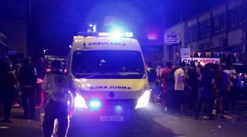 Medic Speaking with Ambulance Driver Stock Footage 33134770