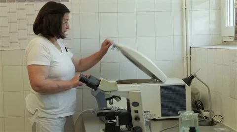 Medic technician using equipment for laboratory analysis, microbiology. Video stock 50267077
