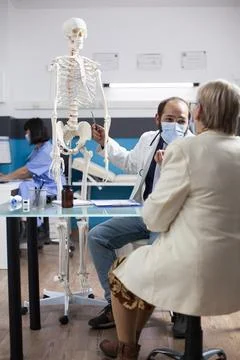 Medical advice using human skeleton Stock Photos